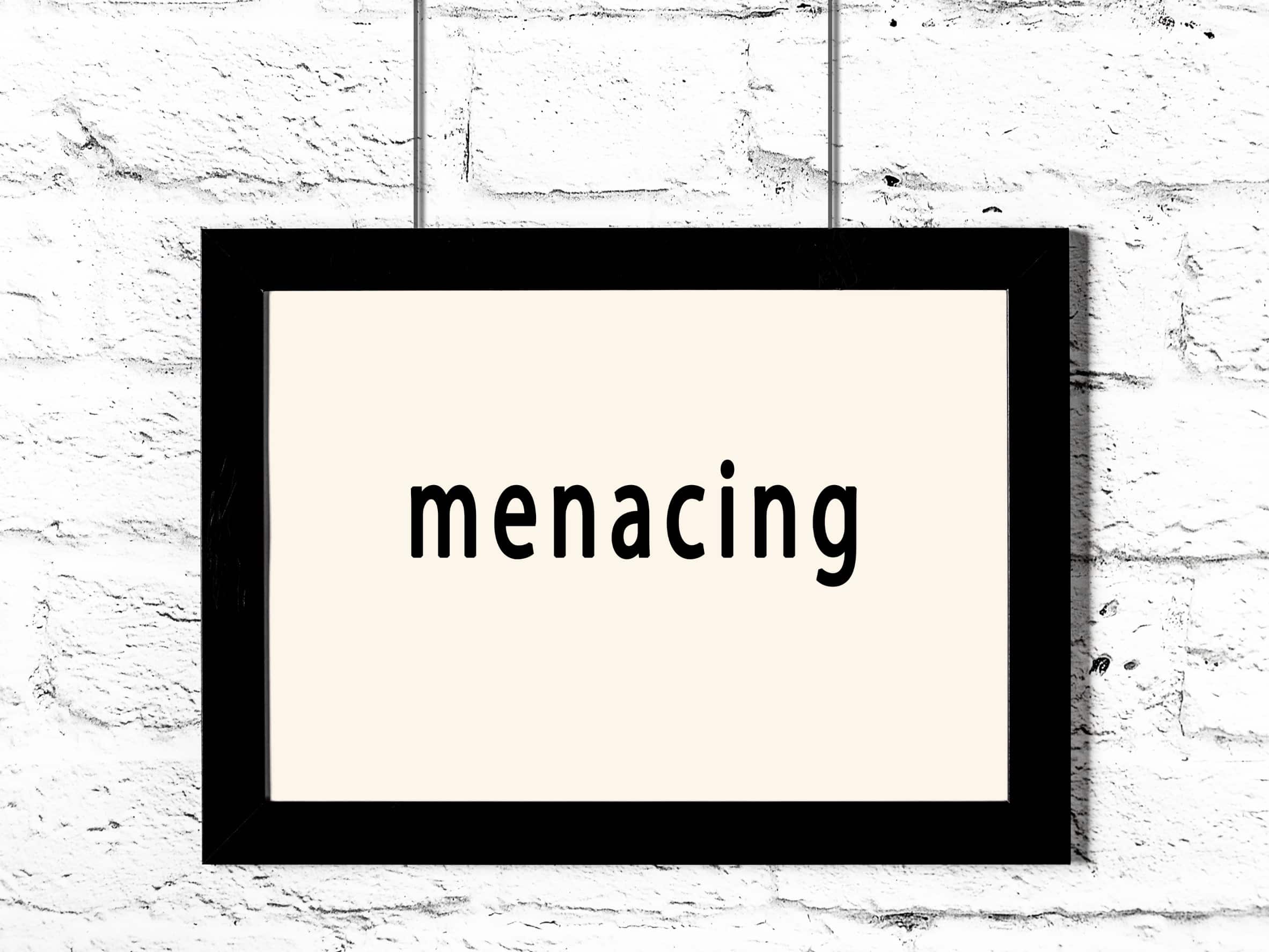 What is the meaning of the word MENACINGLY? 